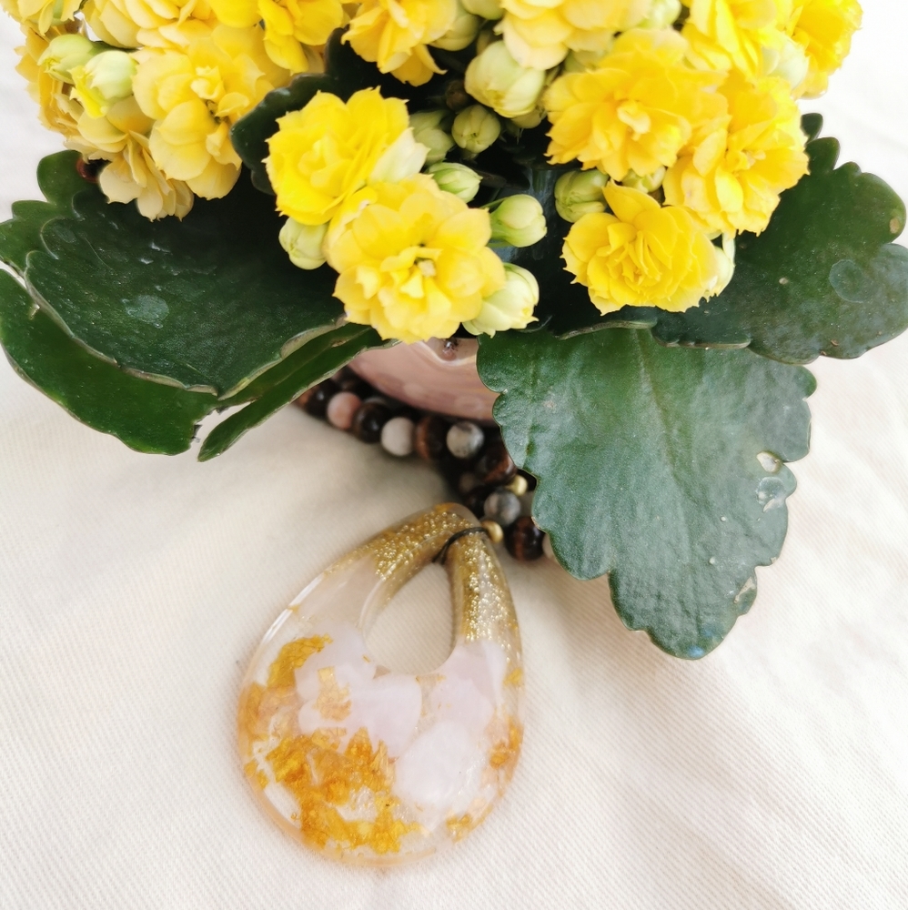Handmade pendant with dried roses and rose quartz